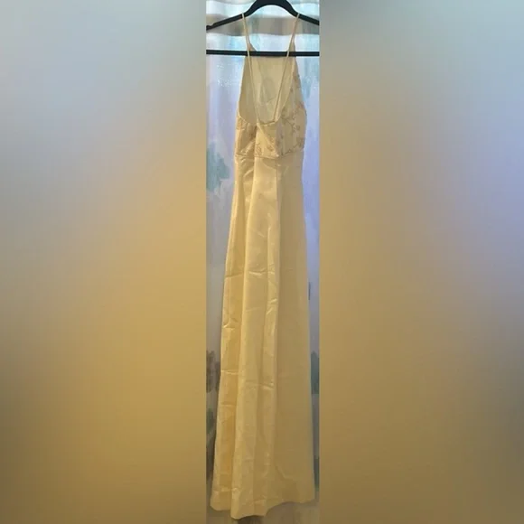 Ivory/cream dress with spaghetti straps and a zipper in the back. Gently used. - Picture 4 of 11